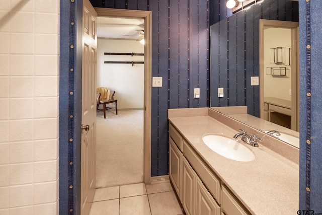 bathroom featuring ceiling fan, tile patterned flooring, and vanity