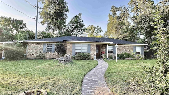 3004 Tower Dr, Tyler, TX 75701 - single story home with a front lawn and brick siding