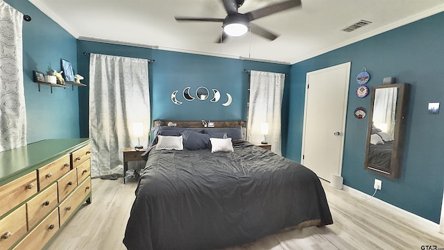 3004 Tower Dr, Tyler, TX 75701 - bedroom with light wood-type flooring, crown molding, and a ceiling fan