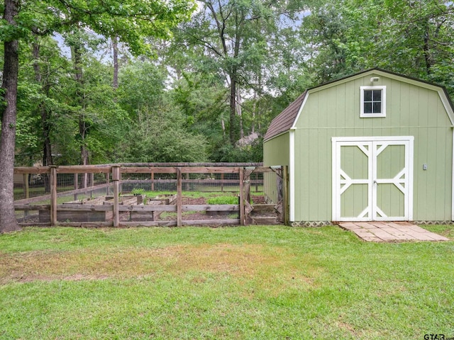 121 Rolling Rdg, Holly Lake Ranch, TX 75765 - view of shed with a garden