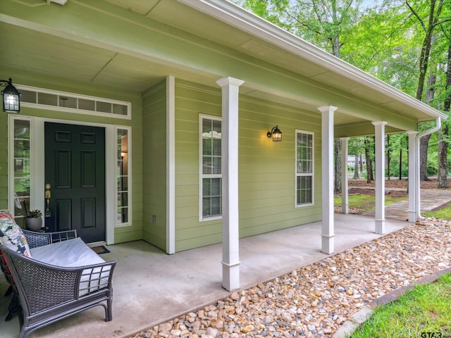 121 Rolling Rdg, Holly Lake Ranch, TX 75765 - view of exterior entry with a porch
