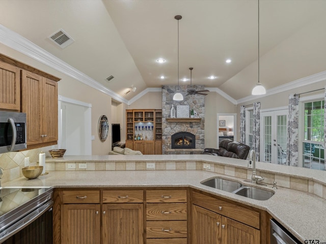 121 Rolling Rdg, Holly Lake Ranch, TX 75765 - kitchen featuring stainless steel appliances, a sink, open floor plan, ceiling fan, and lofted ceiling