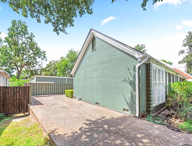 view of home's exterior featuring a patio area