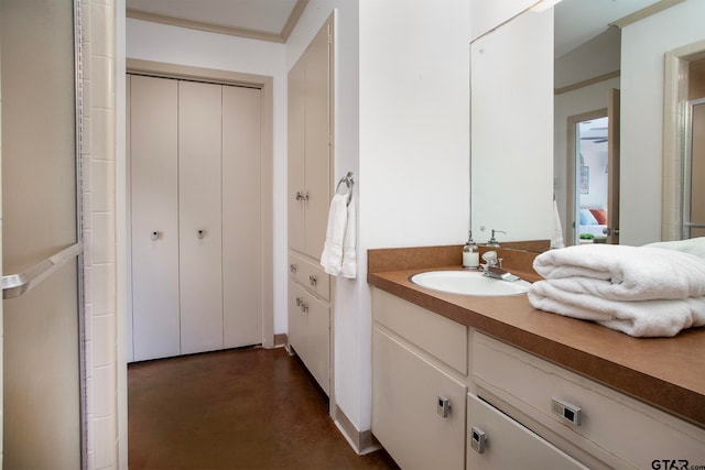 bathroom with concrete flooring and vanity