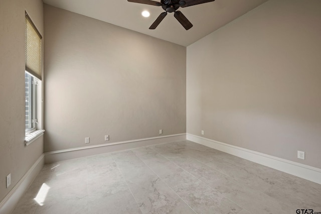 5581 Nancy Cir, Chandler, TX 75758 - spare room with a ceiling fan and baseboards