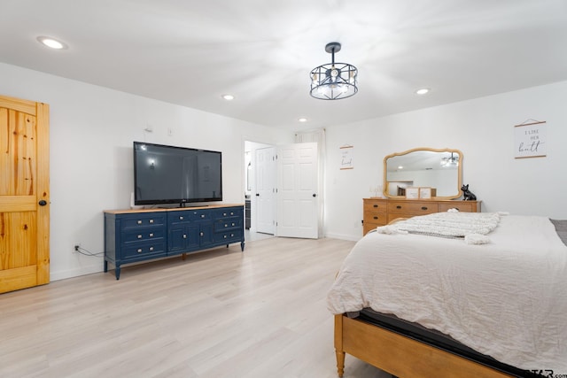 bedroom featuring light hardwood / wood-style floors