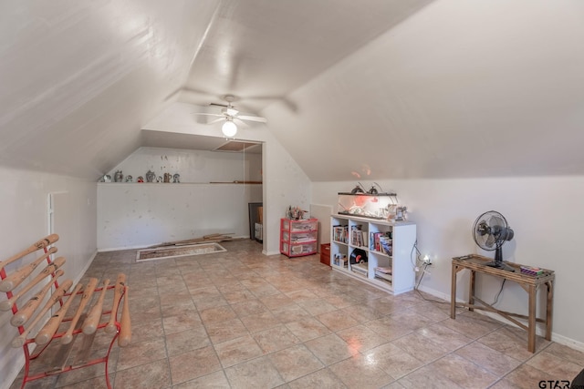 additional living space featuring ceiling fan and lofted ceiling