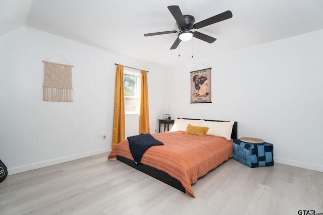 bedroom featuring ceiling fan and light hardwood / wood-style floors