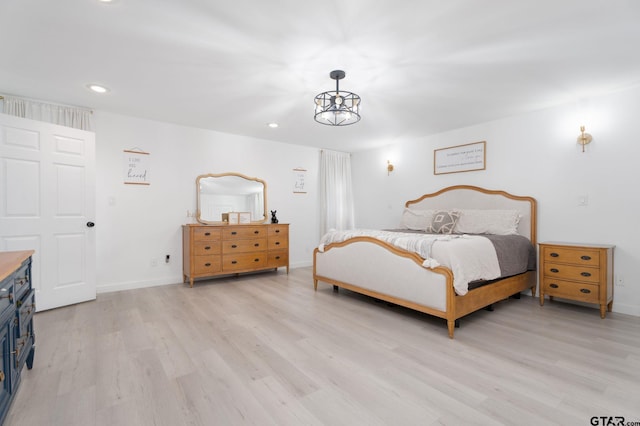 bedroom featuring light hardwood / wood-style floors