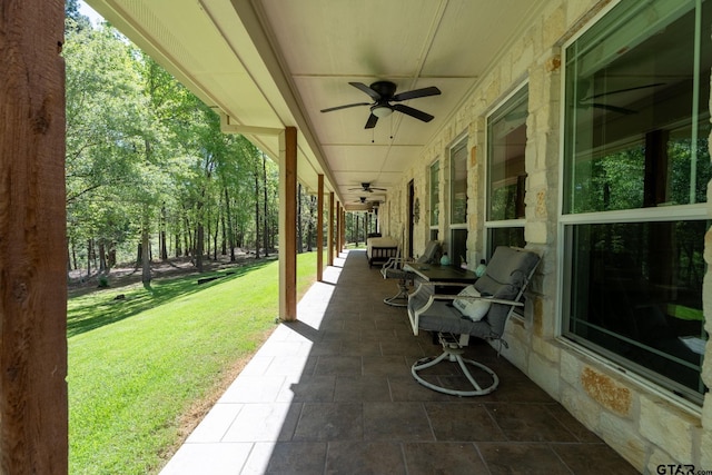 view of patio featuring covered porch and ceiling fan