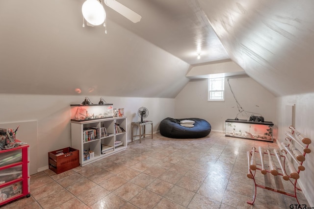 game room featuring vaulted ceiling and ceiling fan