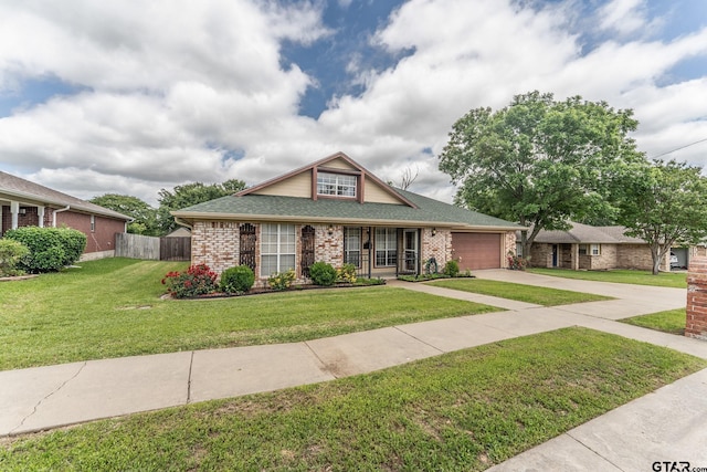 1853 Woodbridge Dr, Sulphur Springs, TX 75482 - view of front of property with a garage, driveway, brick siding, and a shingled roof