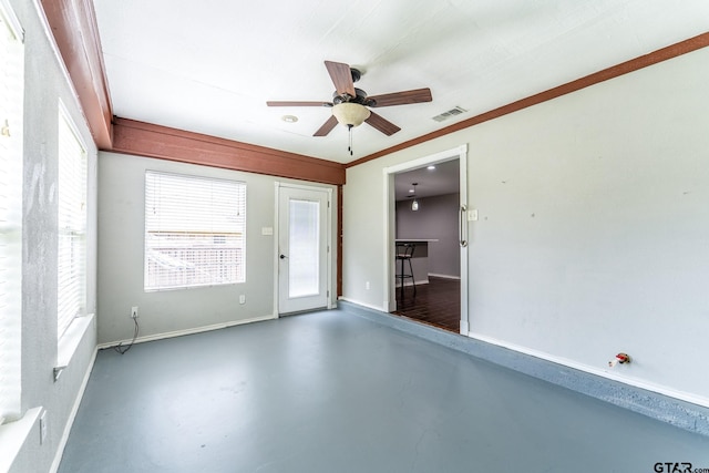 1853 Woodbridge Dr, Sulphur Springs, TX 75482 - empty room featuring concrete flooring, baseboards, and a ceiling fan