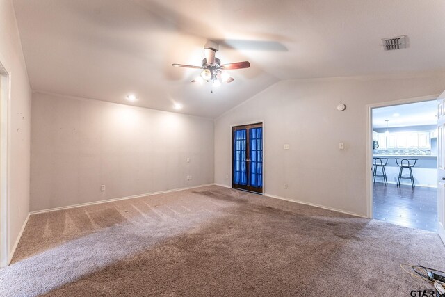 1853 Woodbridge Dr, Sulphur Springs, TX 75482 - unfurnished room with a ceiling fan, carpet flooring, lofted ceiling, and baseboards