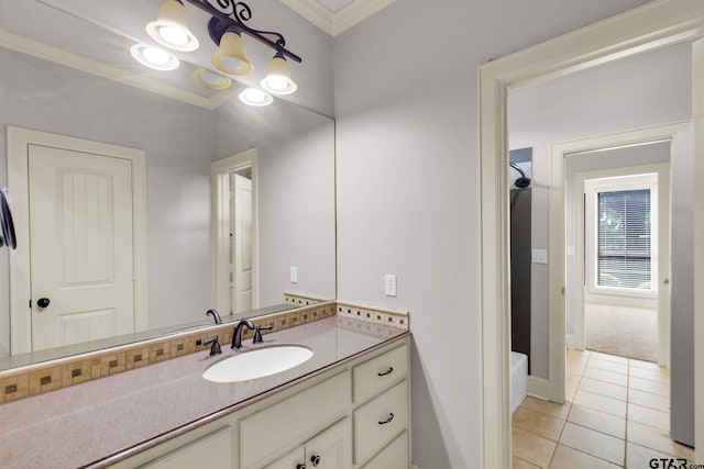 bathroom featuring vanity, tile patterned floors, and crown molding