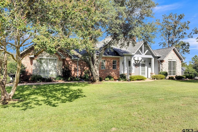 view of front of home with a front yard