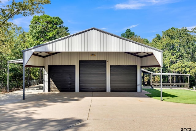 garage with a lawn