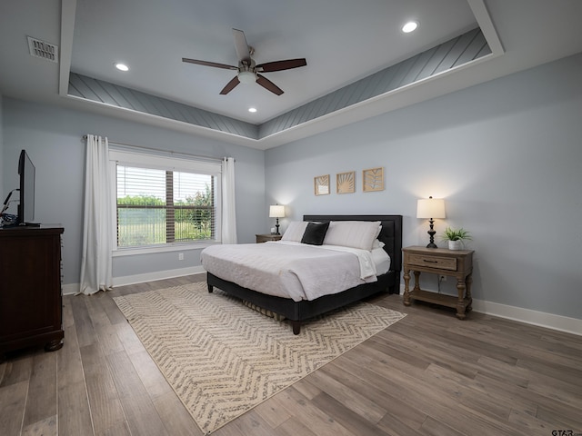 217 Providence Pl, Bullard, TX 75757 - bedroom with a tray ceiling, wood finished floors, ceiling fan, and recessed lighting