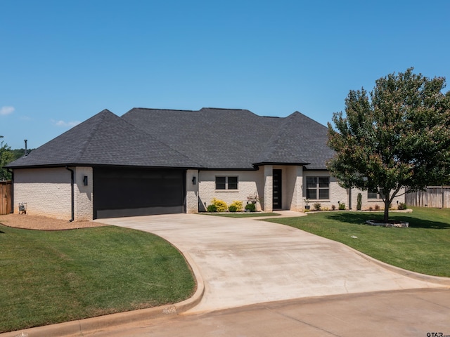 217 Providence Pl, Bullard, TX 75757 - french country inspired facade with brick siding, a garage, driveway, and a shingled roof