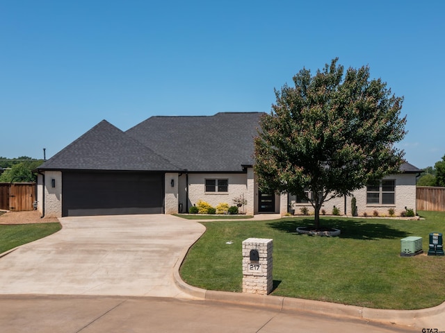 217 Providence Pl, Bullard, TX 75757 - view of front of home with a garage, concrete driveway, brick siding, and a shingled roof
