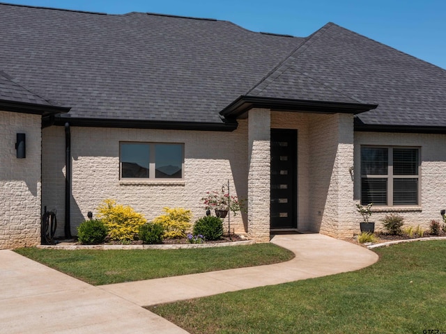 217 Providence Pl, Bullard, TX 75757 - view of front of house featuring a shingled roof, brick siding, and a front yard