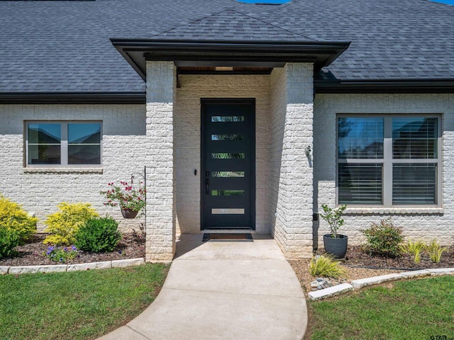 217 Providence Pl, Bullard, TX 75757 - view of exterior entry with a shingled roof and brick siding