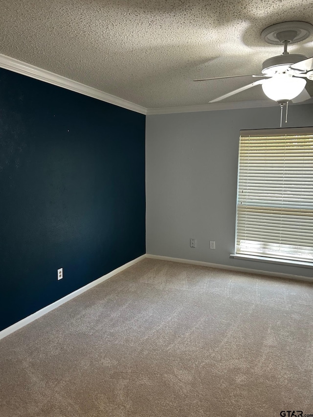 715 Belmont Dr, Athens, TX 75751 - unfurnished room with carpet, ceiling fan, ornamental molding, a textured ceiling, and baseboards