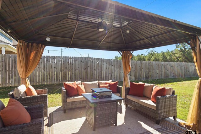 view of patio / terrace featuring a gazebo and an outdoor living space