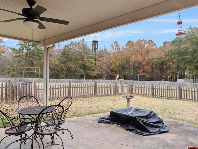 view of patio featuring ceiling fan