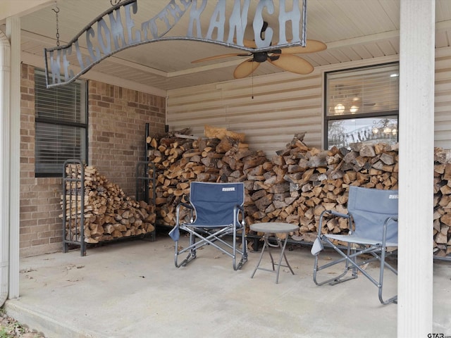 view of patio / terrace featuring ceiling fan