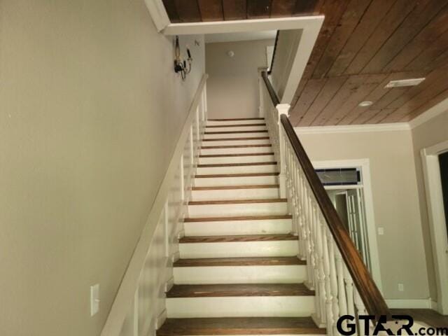601 Holbrook St, Mount Vernon, TX 75457 - stairs with wood ceiling, wood finished floors, and crown molding
