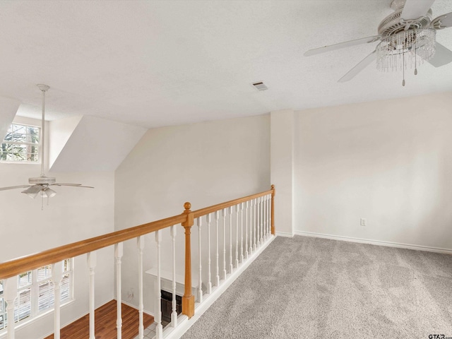 221 Butternut Gln, Holly Lake Ranch, TX 75765 - hallway with baseboards and carpet floors