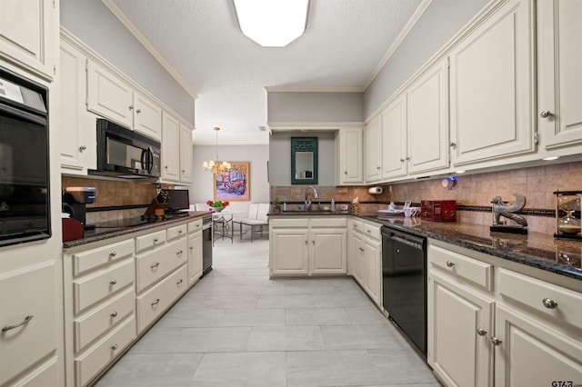 kitchen featuring a sink, tasteful backsplash, an inviting chandelier, black appliances, and ornamental molding