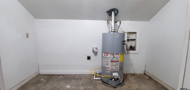 utility room featuring gas water heater