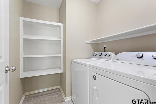 9190 Teal Flight Way, Tyler, TX 75703 - laundry room with washer and clothes dryer and baseboards