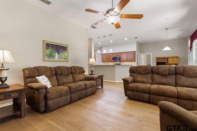 9190 Teal Flight Way, Tyler, TX 75703 - living room featuring a ceiling fan, light wood-type flooring, and recessed lighting
