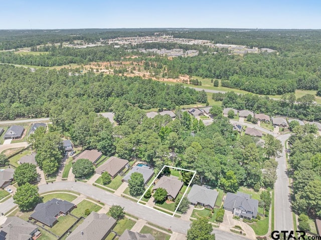 9190 Teal Flight Way, Tyler, TX 75703 - aerial overview of property's location featuring property parcel outlined, nearby suburban area, and a heavily wooded area