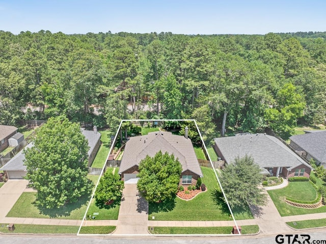 9190 Teal Flight Way, Tyler, TX 75703 - aerial view of property's location with property parcel outlined and a heavily wooded area
