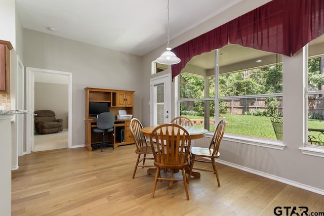 9190 Teal Flight Way, Tyler, TX 75703 - dining room featuring an office area, light wood finished floors, baseboards, and french doors