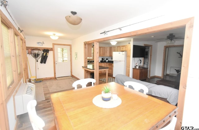 1611 County Road 1858, Yantis, TX 75497 - dining area with baseboards and ceiling fan