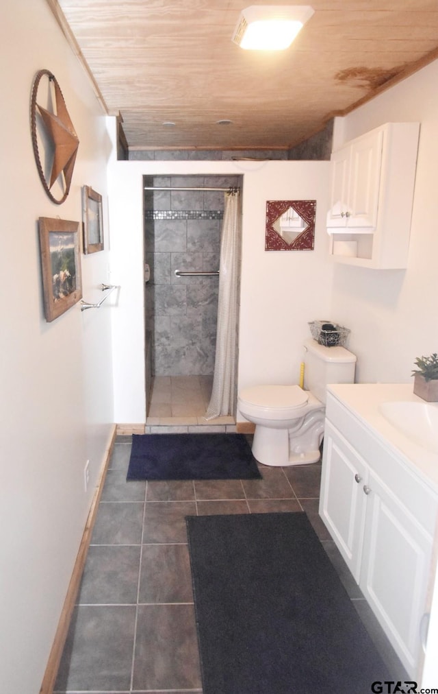 1611 County Road 1858, Yantis, TX 75497 - bathroom with wood ceiling, vanity, tiled shower, and tile patterned floors