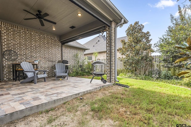 view of patio featuring ceiling fan