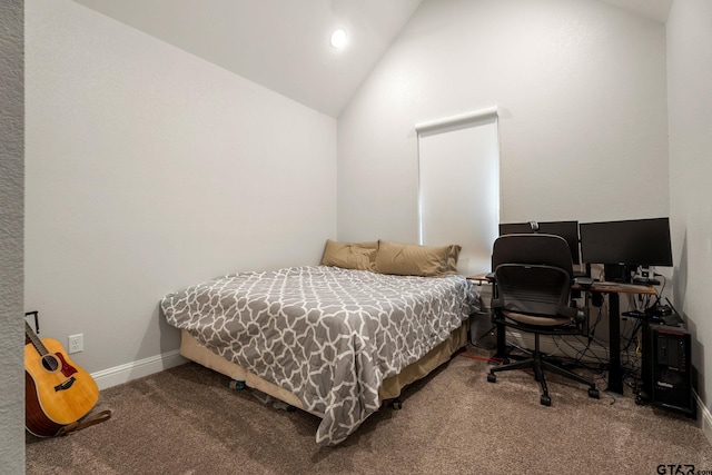 bedroom with carpet flooring and vaulted ceiling