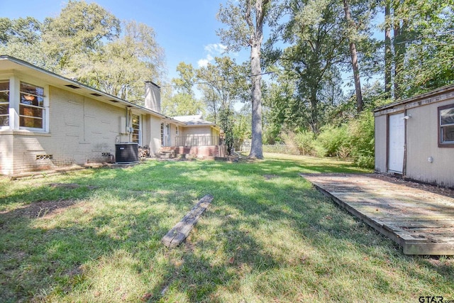 view of yard featuring central AC