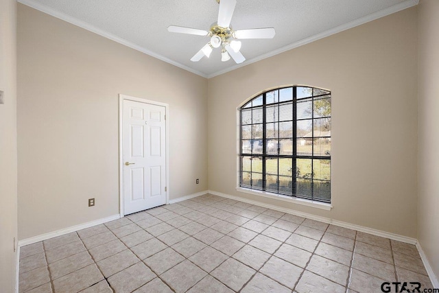 empty room featuring ceiling fan, light tile patterned flooring, crown molding, and a textured ceiling