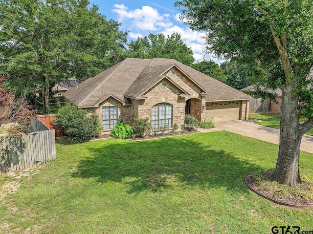19173 Greenleaf Dr, Flint, TX 75762 - view of front facade featuring concrete driveway, a garage, brick siding, and roof with shingles