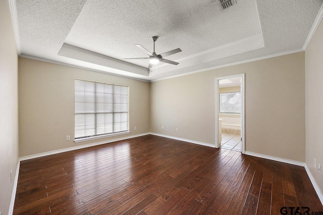 19173 Greenleaf Dr, Flint, TX 75762 - unfurnished room featuring a raised ceiling, a textured ceiling, a ceiling fan, hardwood / wood-style flooring, and baseboards