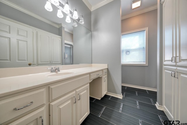 bathroom with ornamental molding and vanity