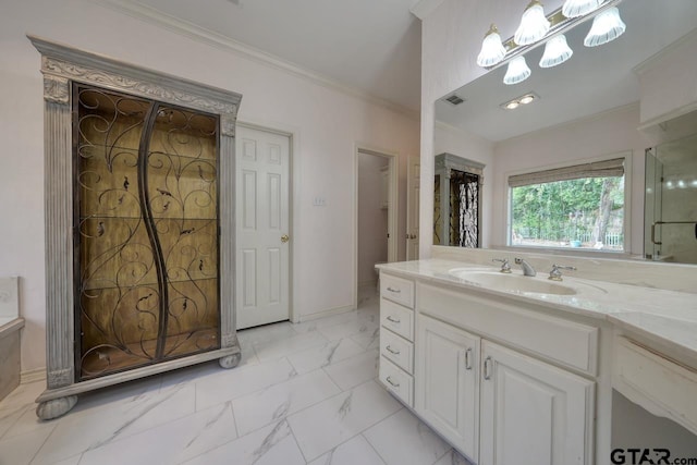 bathroom featuring vanity and crown molding