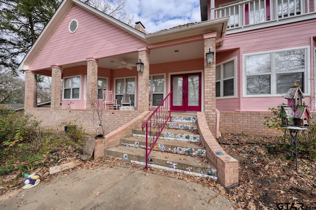 view of front of house featuring french doors and a porch